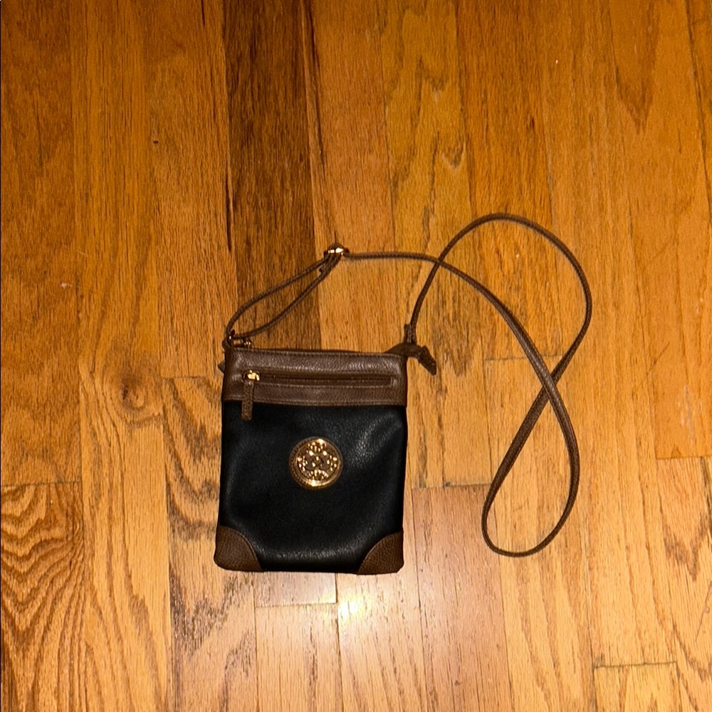 Sleek Black Crossbody Bag with Gold Hardware